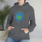 a woman wearing a gray Not High, Just Well Cannabis Hoodie with a marijuana leaf on it.
