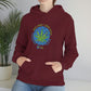A woman wearing a maroon hoodie with the product name "Not High, Just Well Cannabis Hoodie" on it.