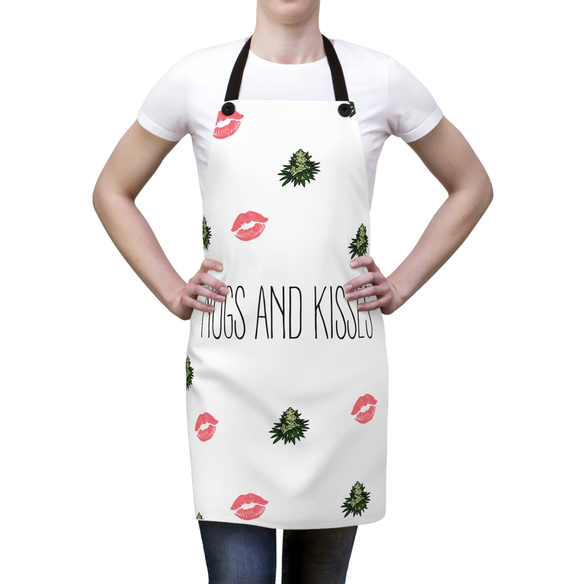 A woman wears the Nugs and Kisses Chef's Apron with green nugs and pink kisses  