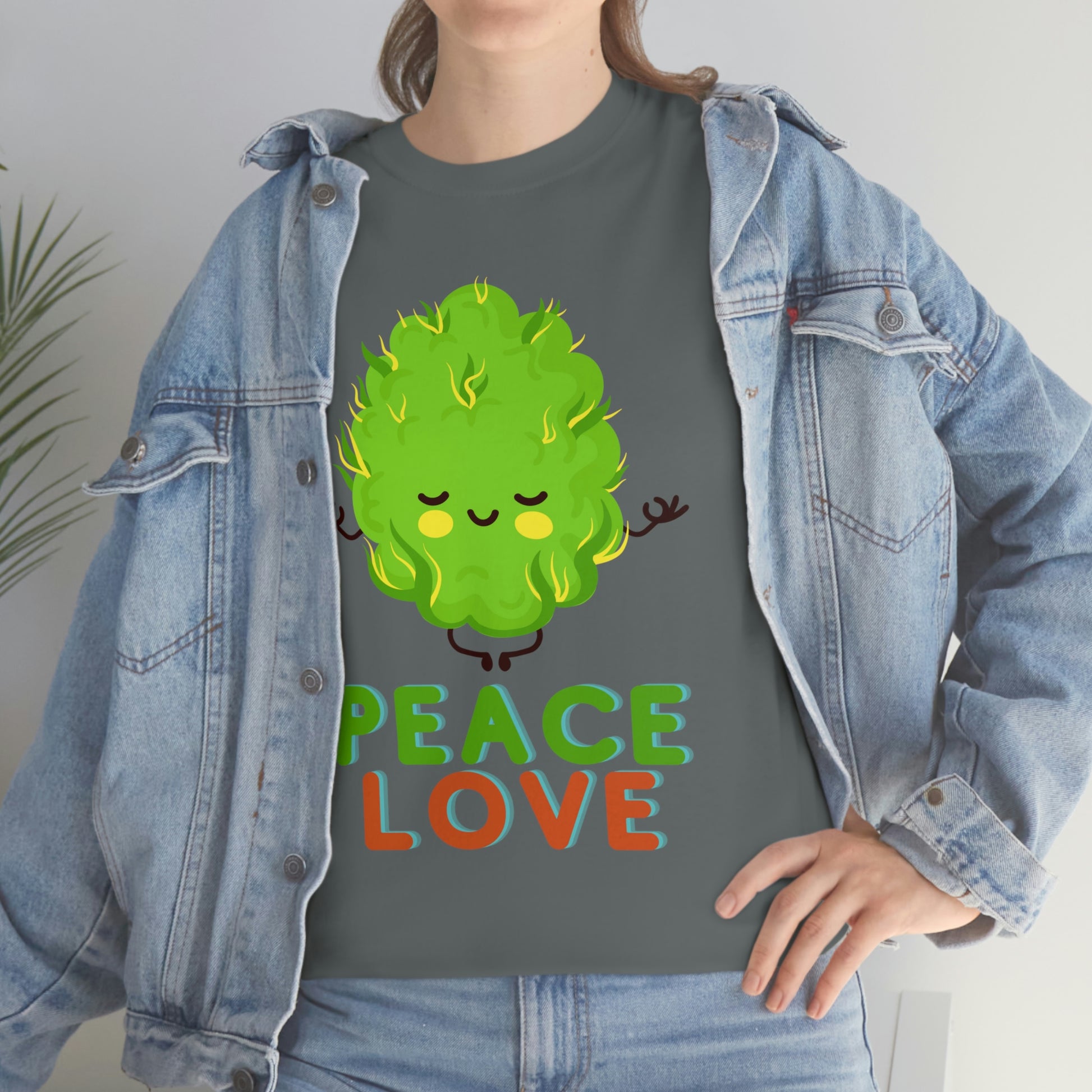 a woman wearing a Peace and Love Tee.