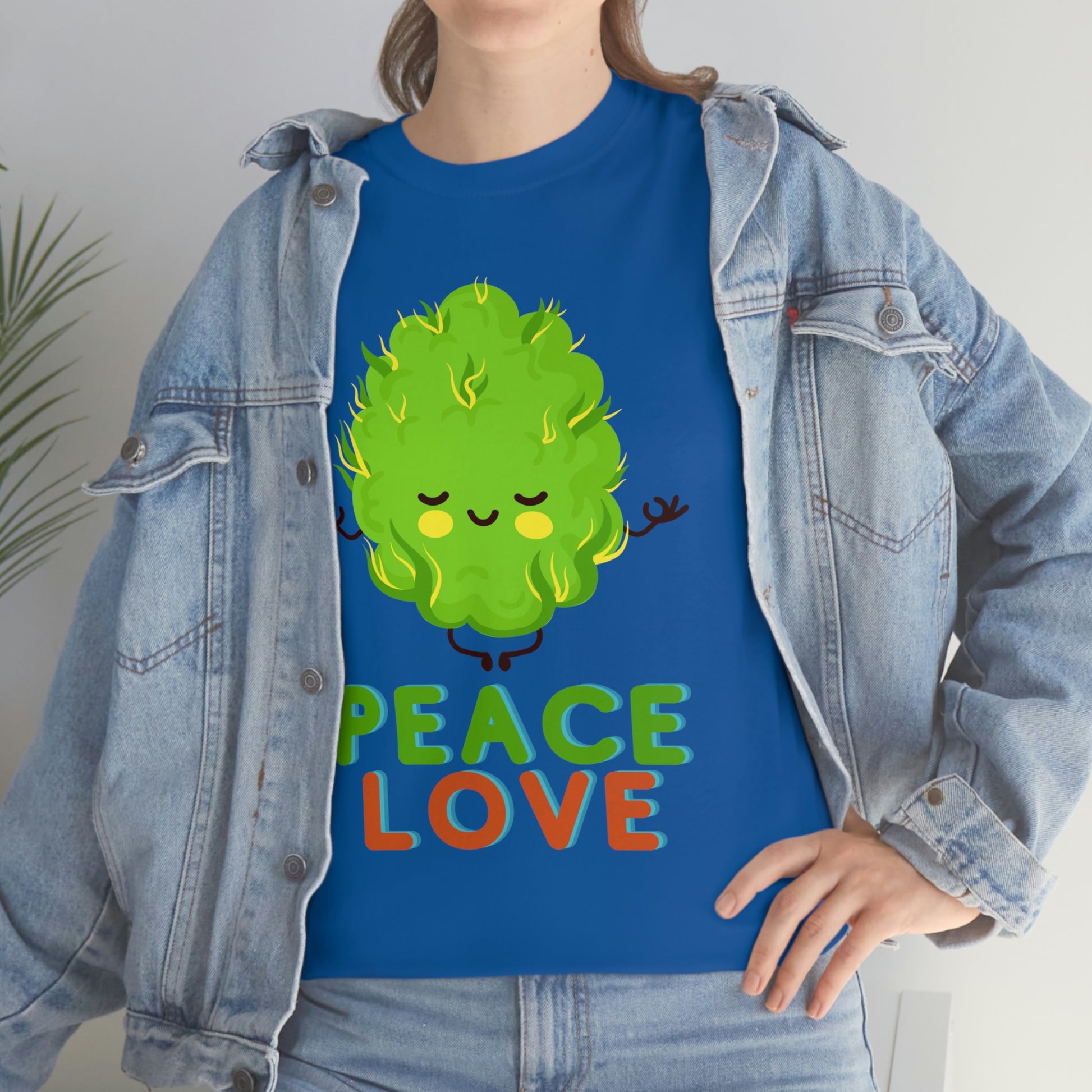 a woman wearing a blue Peace and Love Tee.