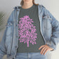A woman wearing a Pink Cannabis Flowers Tee with pink leaves on it.
