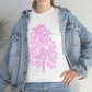 a woman wearing a Pink Cannabis Flowers Tee and jeans.