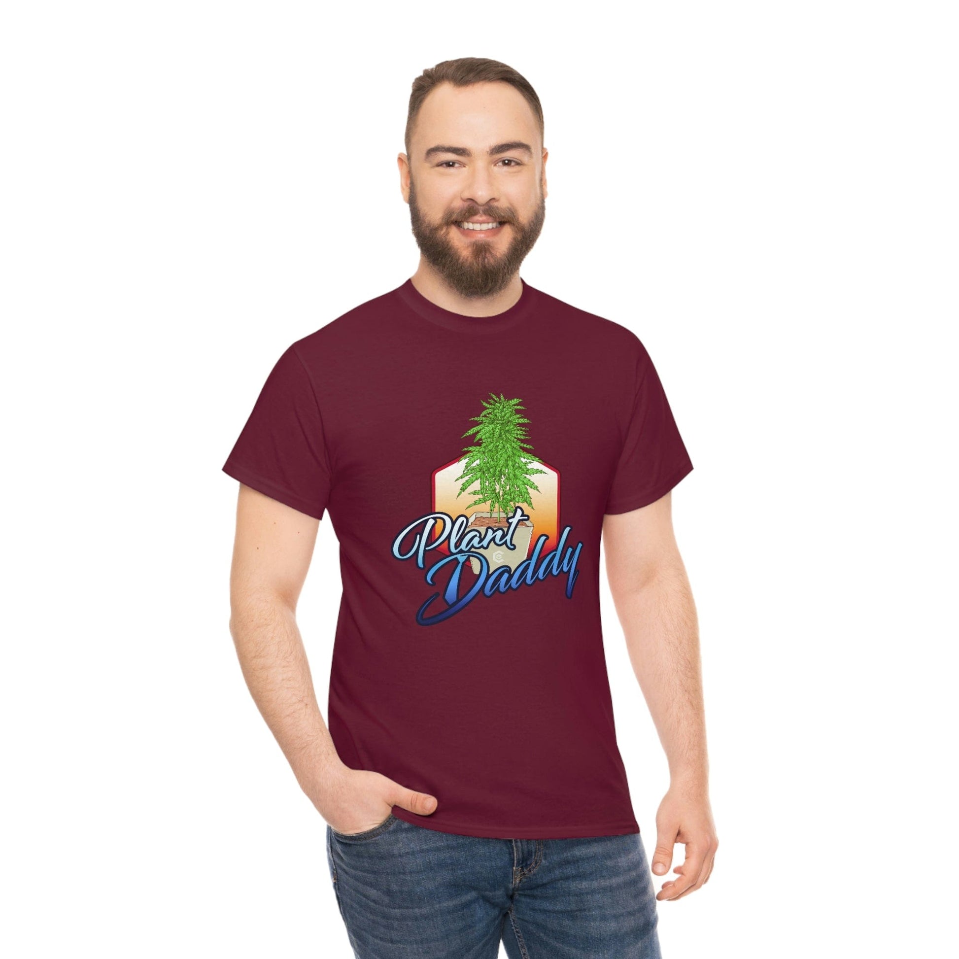 a man wearing a Plant Daddy Cannabis Plant T-Shirt with a tree on it.