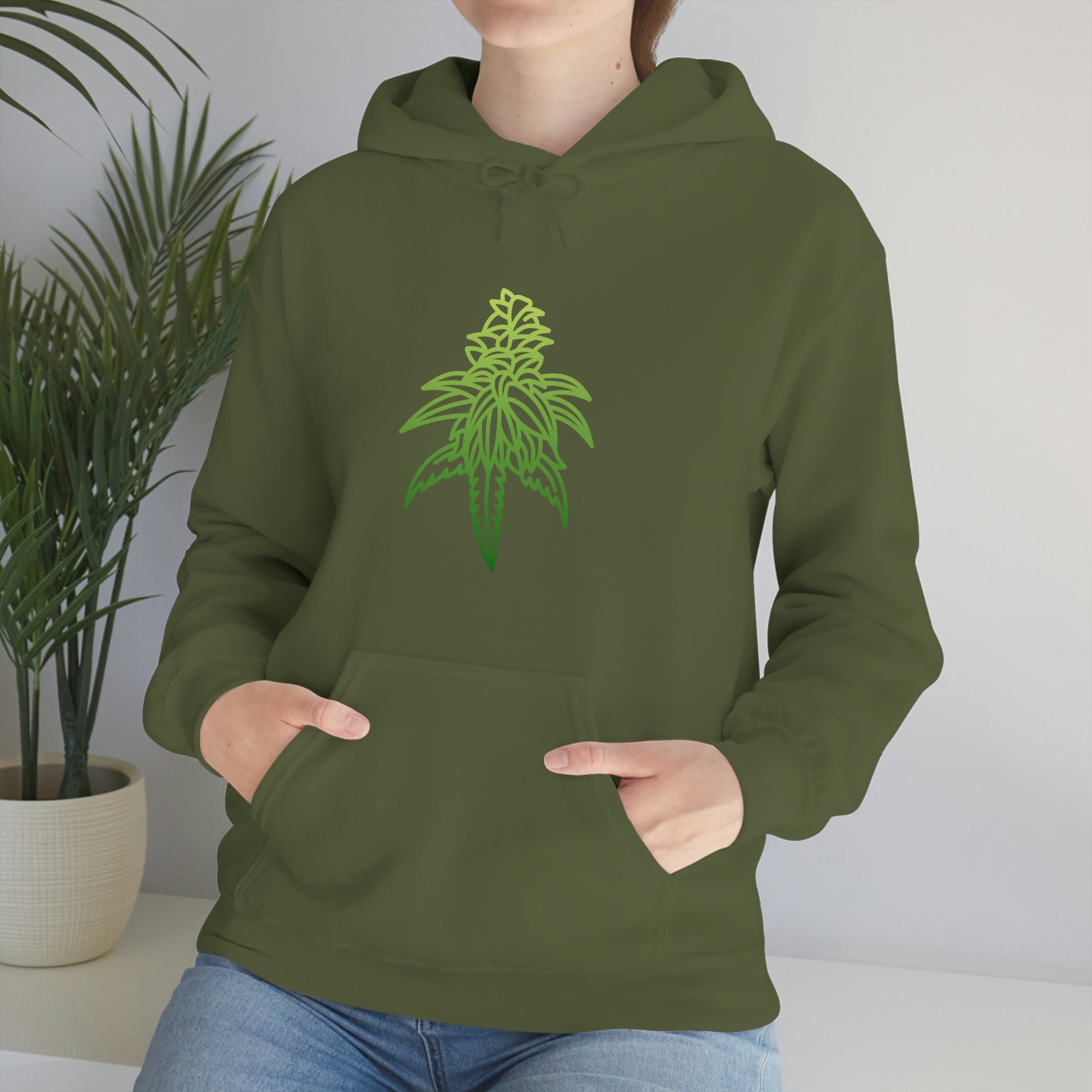 a woman wearing a green Sour Diesel Marijuana Hoodie.