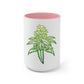 a white and pink Sour Diesel Cannabis Tea Mug with a marijuana leaf on it.