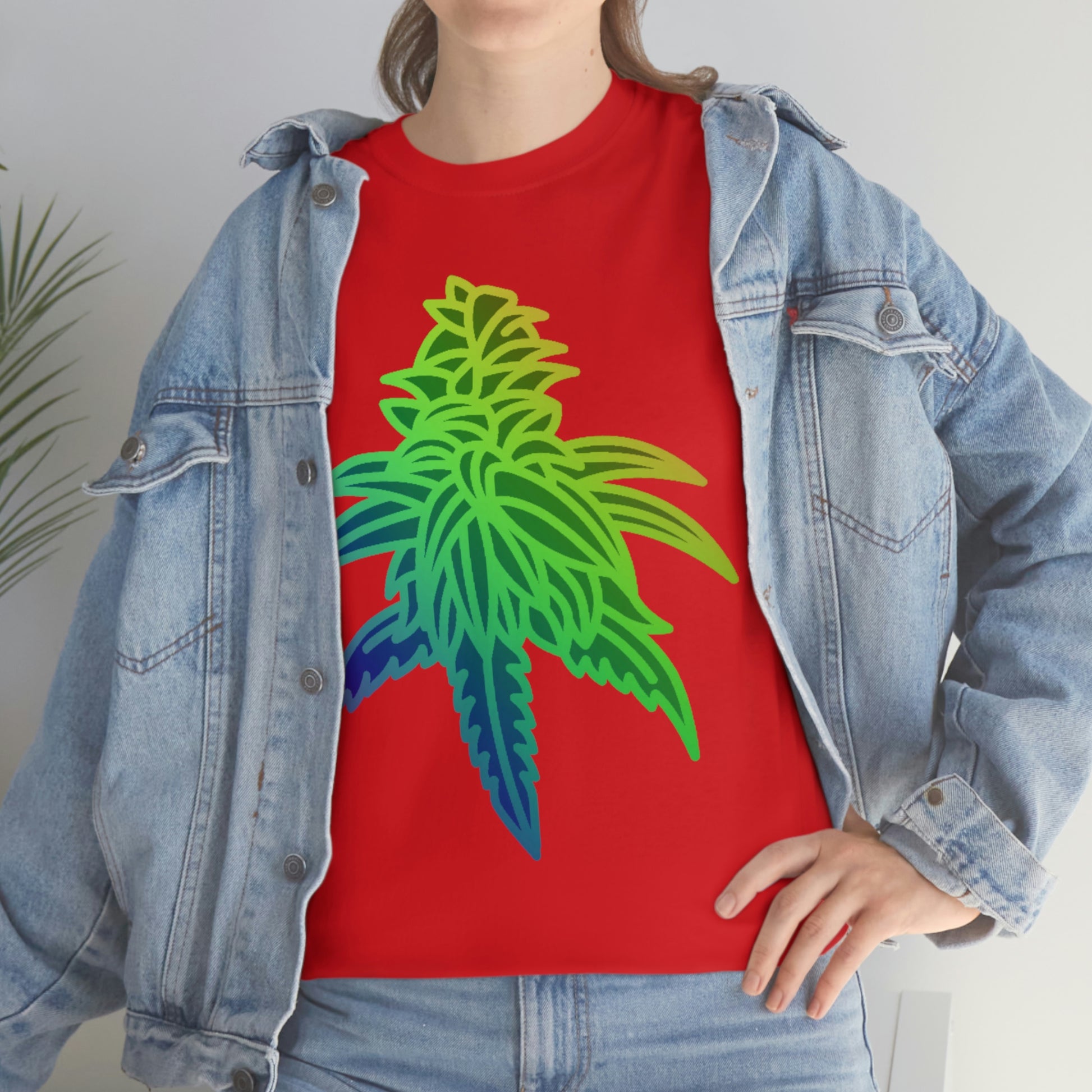 a woman wearing a Rainbow Sherbet Cannabis Tee and jeans.