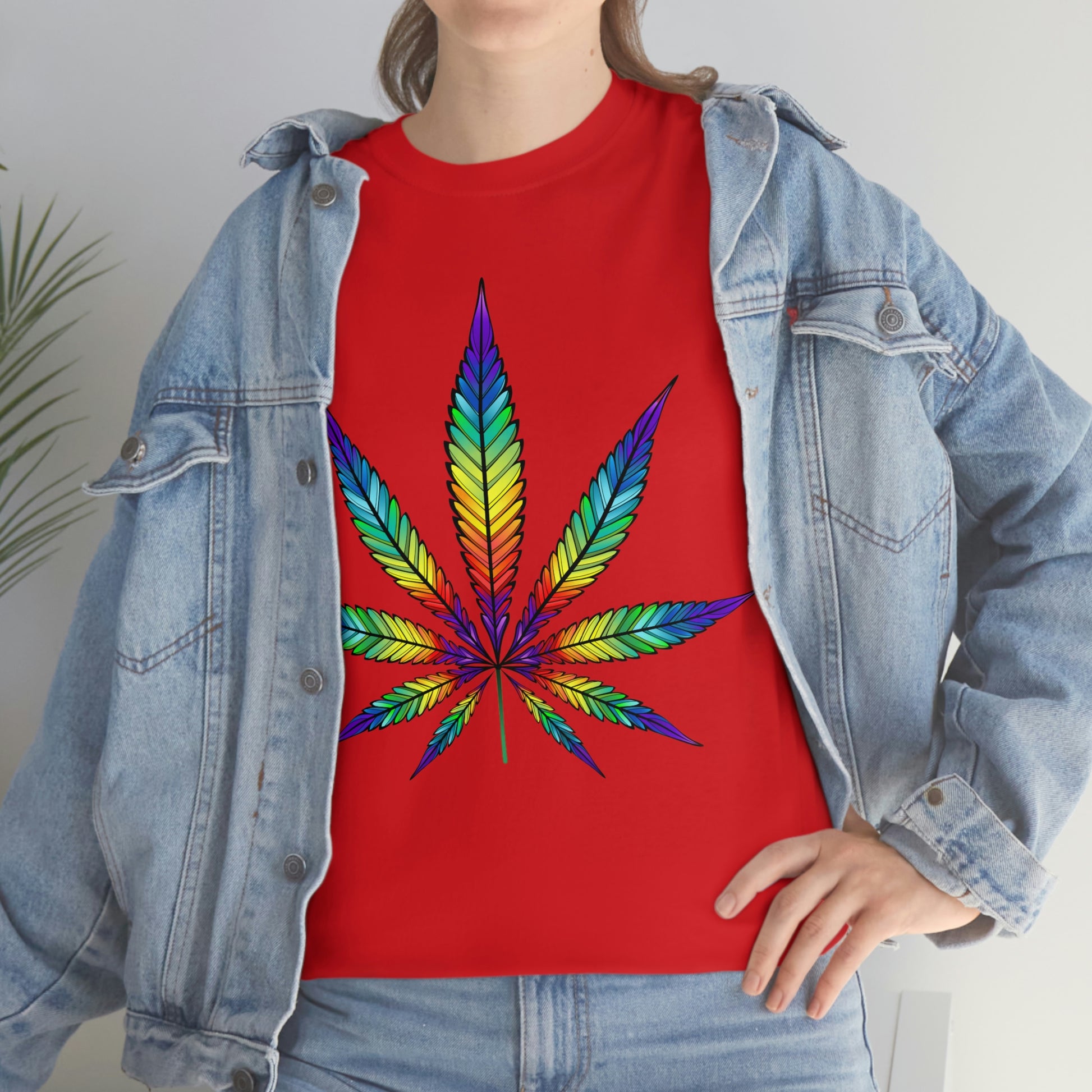a woman wearing a red Rainbow Cannabis Leaf Tee.