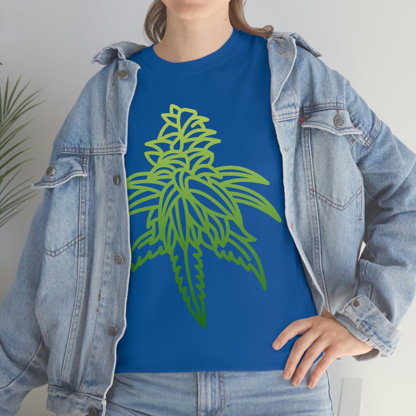 a woman wearing a Sour Diesel Cannabis Tee and jeans.