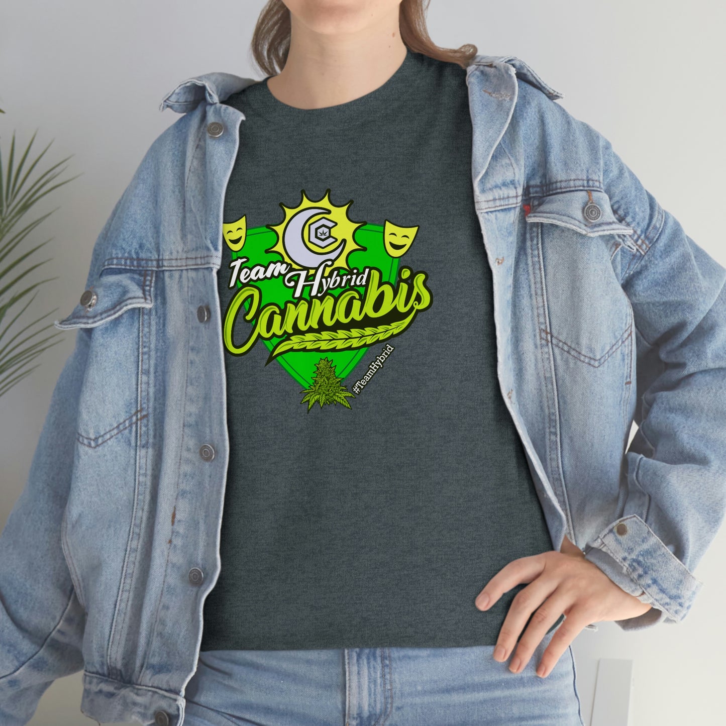 A woman wearing a team hybrid cannabis t-shirt and jean jacket