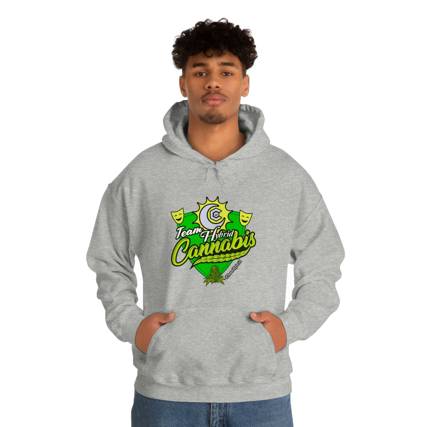 a man wearing a grey Team Hybrid Cannabis Pullover Hoodie with the word coronas on it.