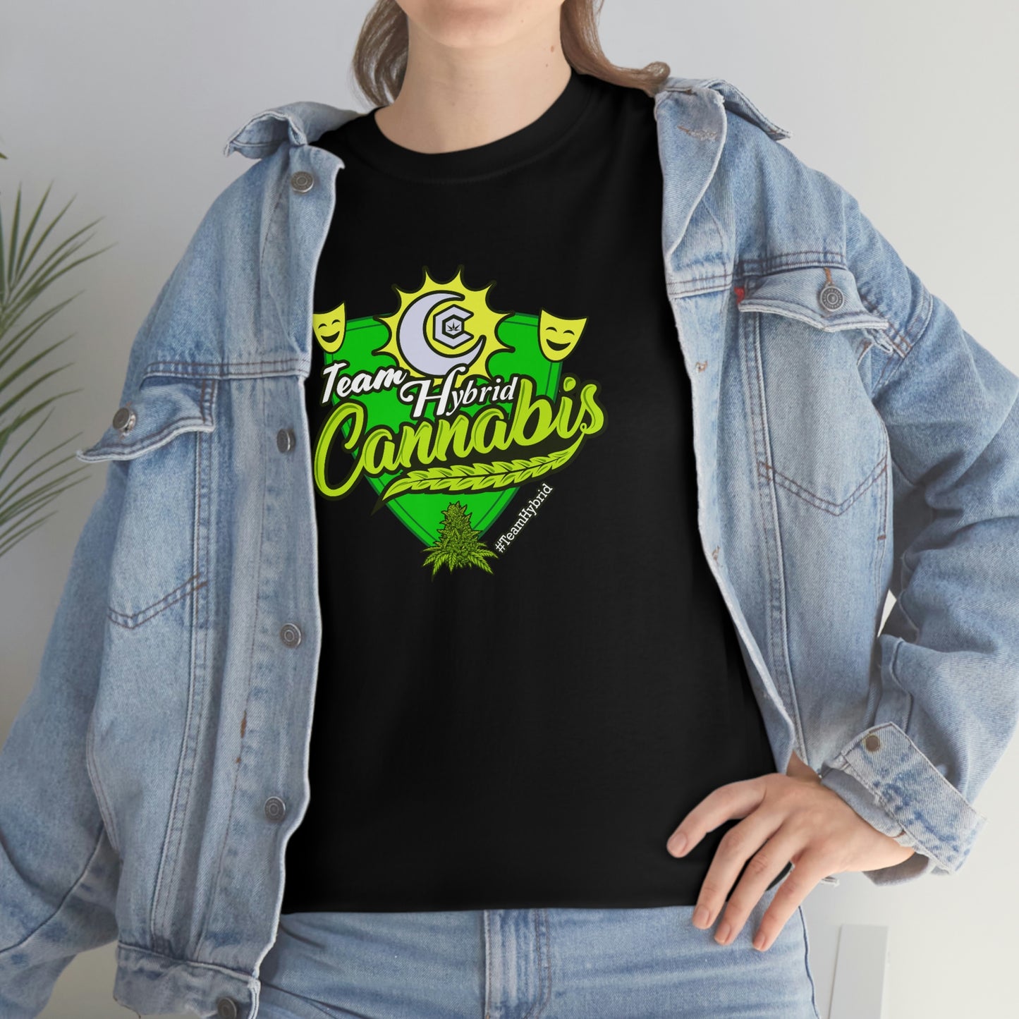 a woman wearing a Team Hybrid Cannabis T-shirt and jeans.