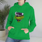 a woman wearing a green hoodie with the words "Team Indica Cannabis" on it.