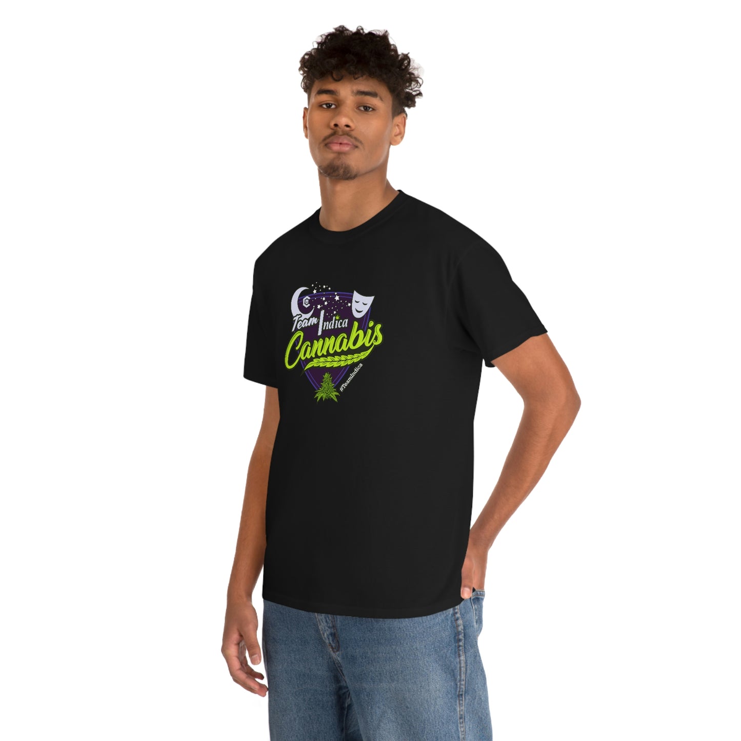 A man wearing a Team Indica Cannabis T-Shirt with a green and purple logo.