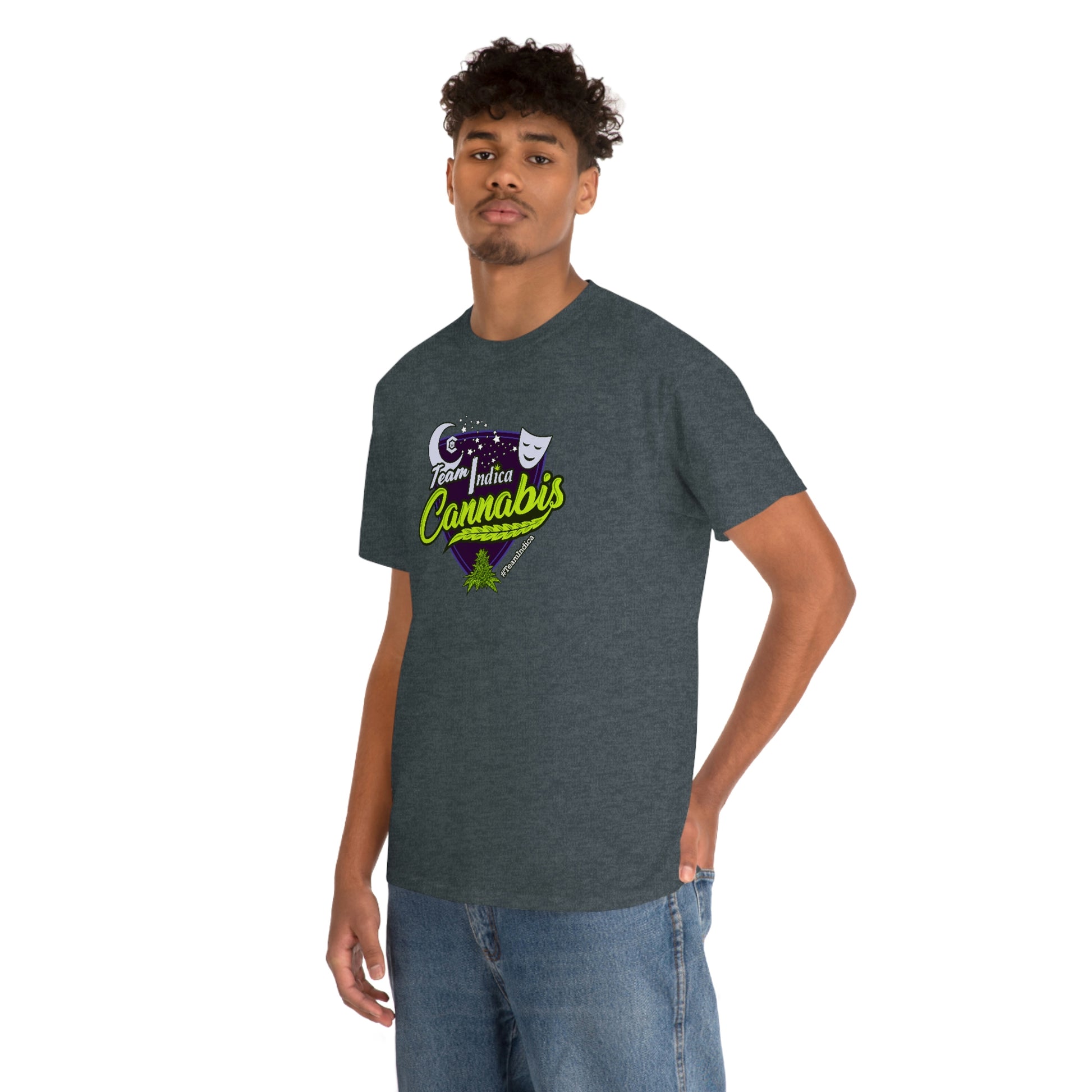 a man wearing a Team Indica Cannabis T-Shirt with a purple and green logo.