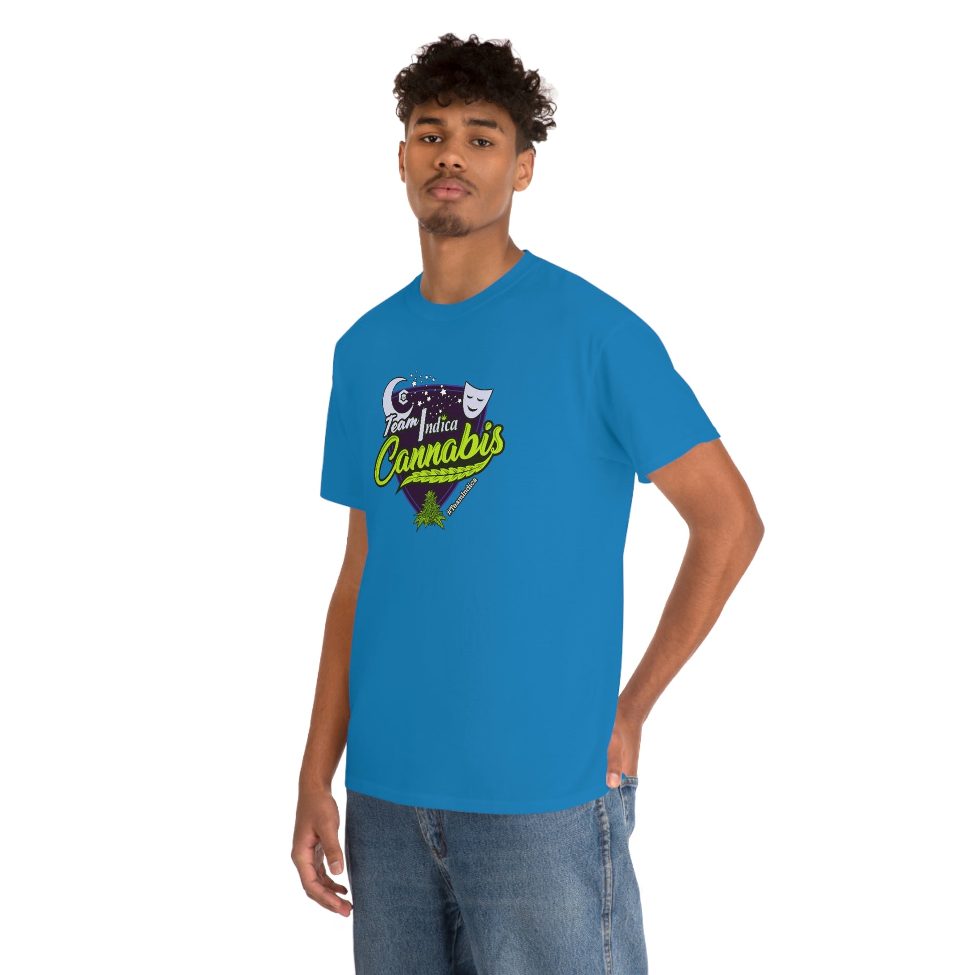 a young man wearing a Team Indica Cannabis T-Shirt with a green and purple logo.