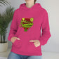 A woman wearing a pink Team Sativa Stoner Sweatshirt with the word cannabis on it.
