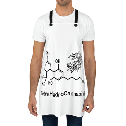 A man wearing the Tetrahydrocannabinol Chef's Apron with pot leaves