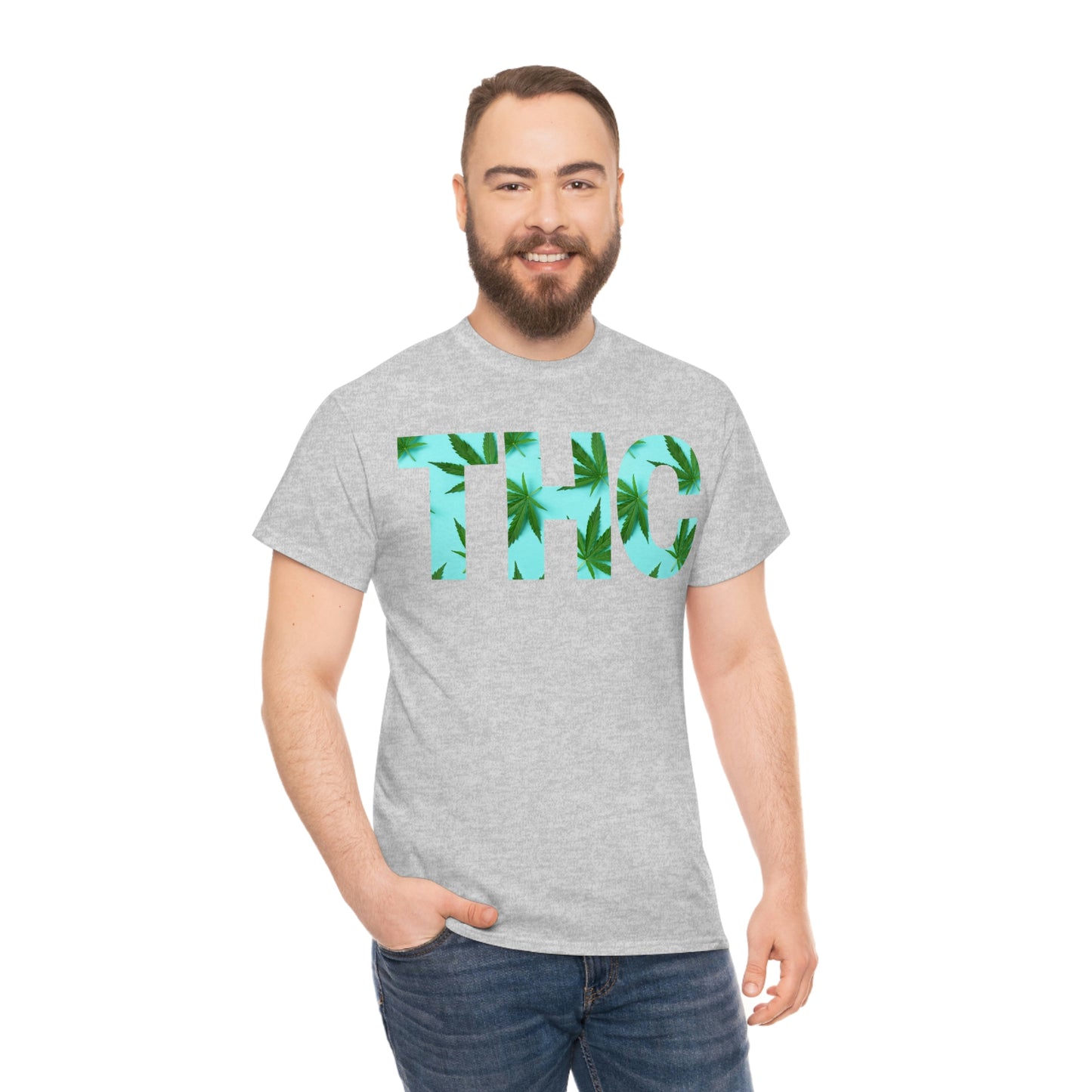 A man wearing a grey Turquoise THC Tee with the word thc on it.