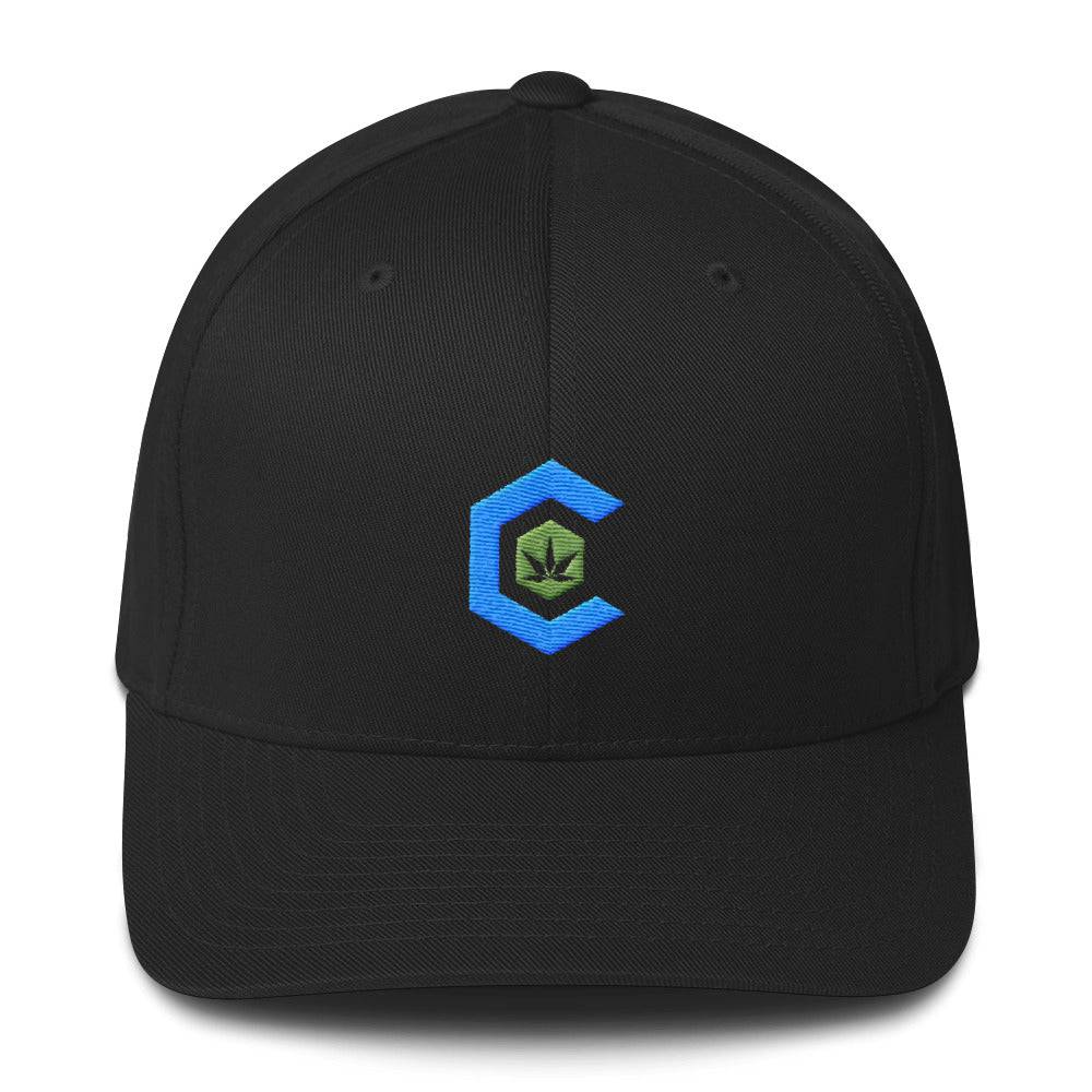 A black snapback hat that shows the cannabis community logo on the front.