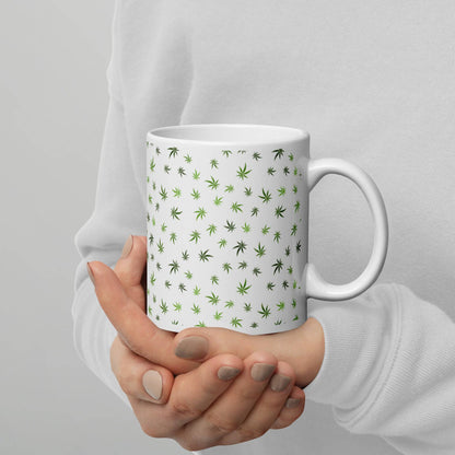 A woman holding a Cannabis Leaf Pattern Mug.