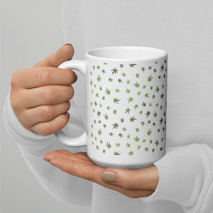 a woman holding a Cannabis Leaf Pattern Mug.