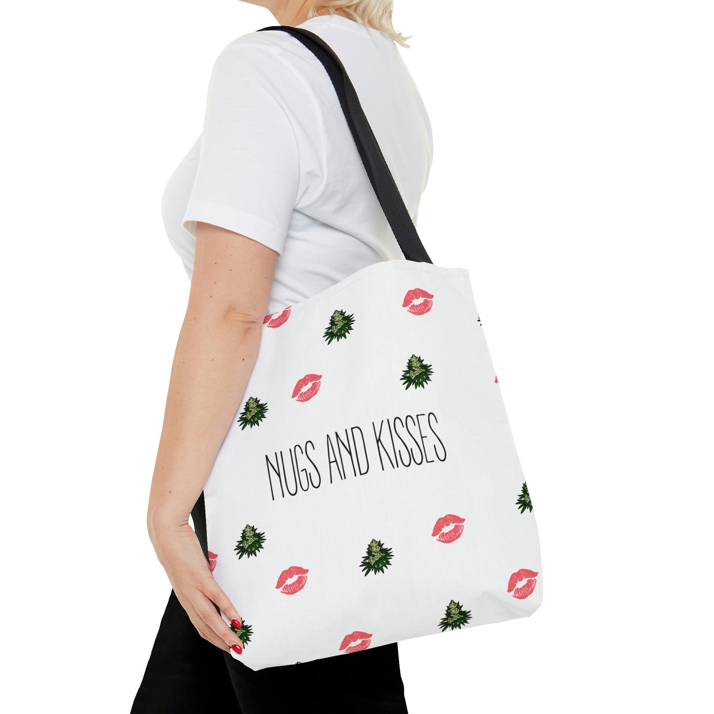 A woman pairs a white t shirt with the white Nugs and Kisses Weed Tote Bag