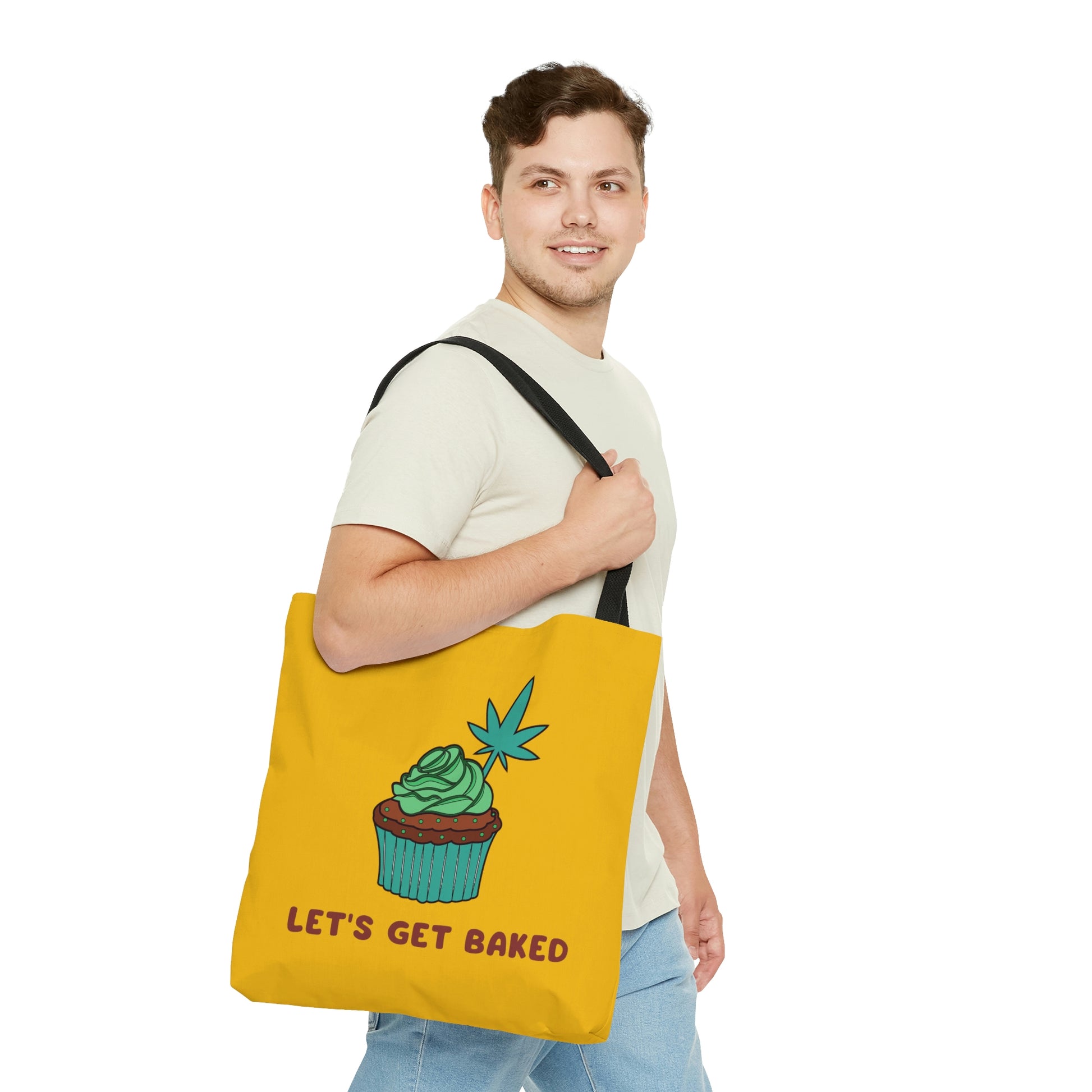 A man looks intently onward while he wears the totally cool Let's Get Baked Yellow Weed Tote Bag