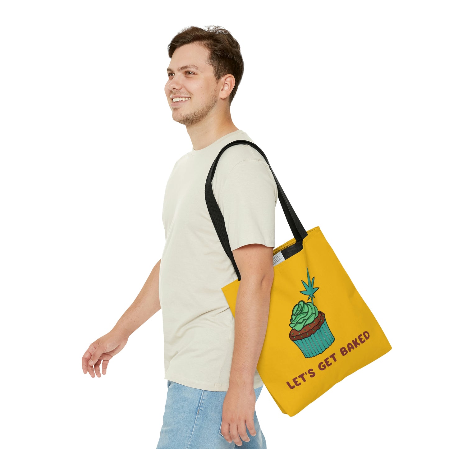 A man decides to walk while wearing the upbeat Let's Get Baked Yellow Weed Tote Bag