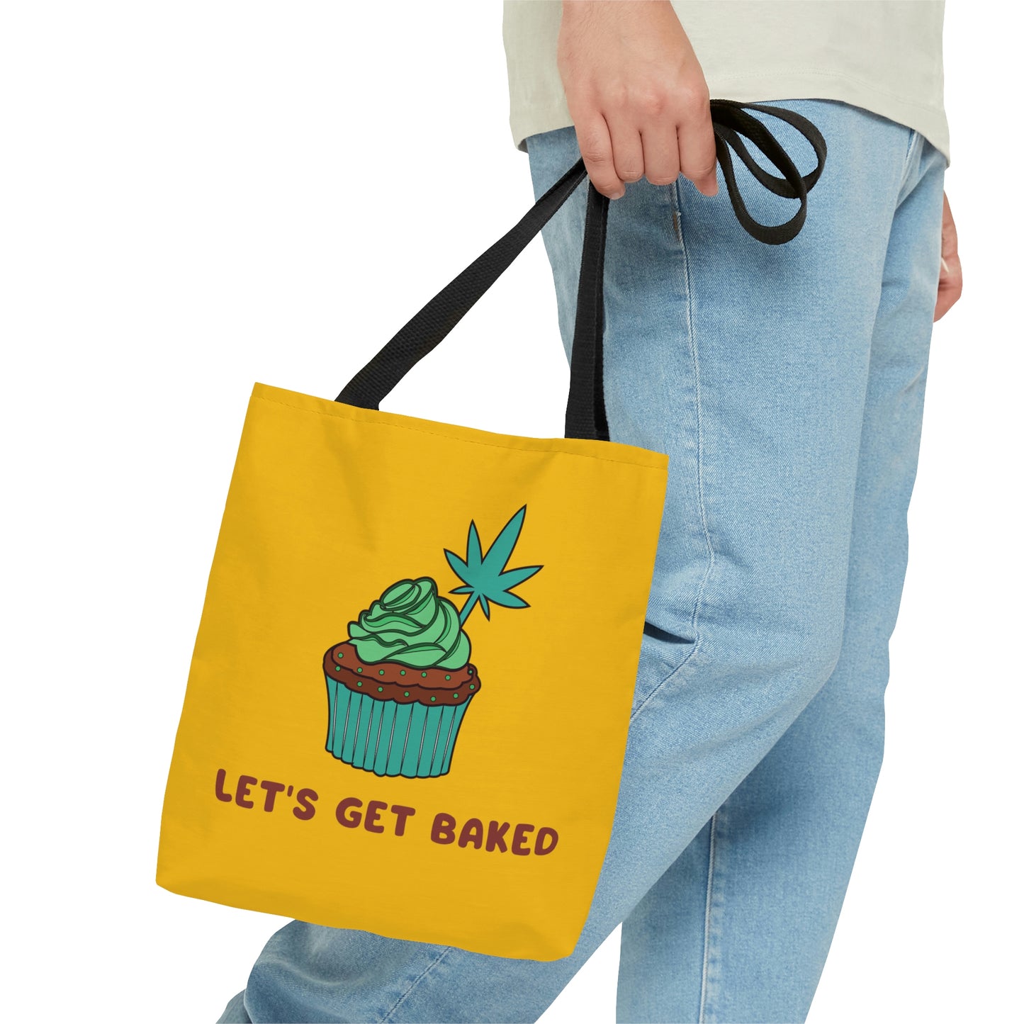 A man has a sporty Let's Get Baked Yellow Marijuana Tote Bag