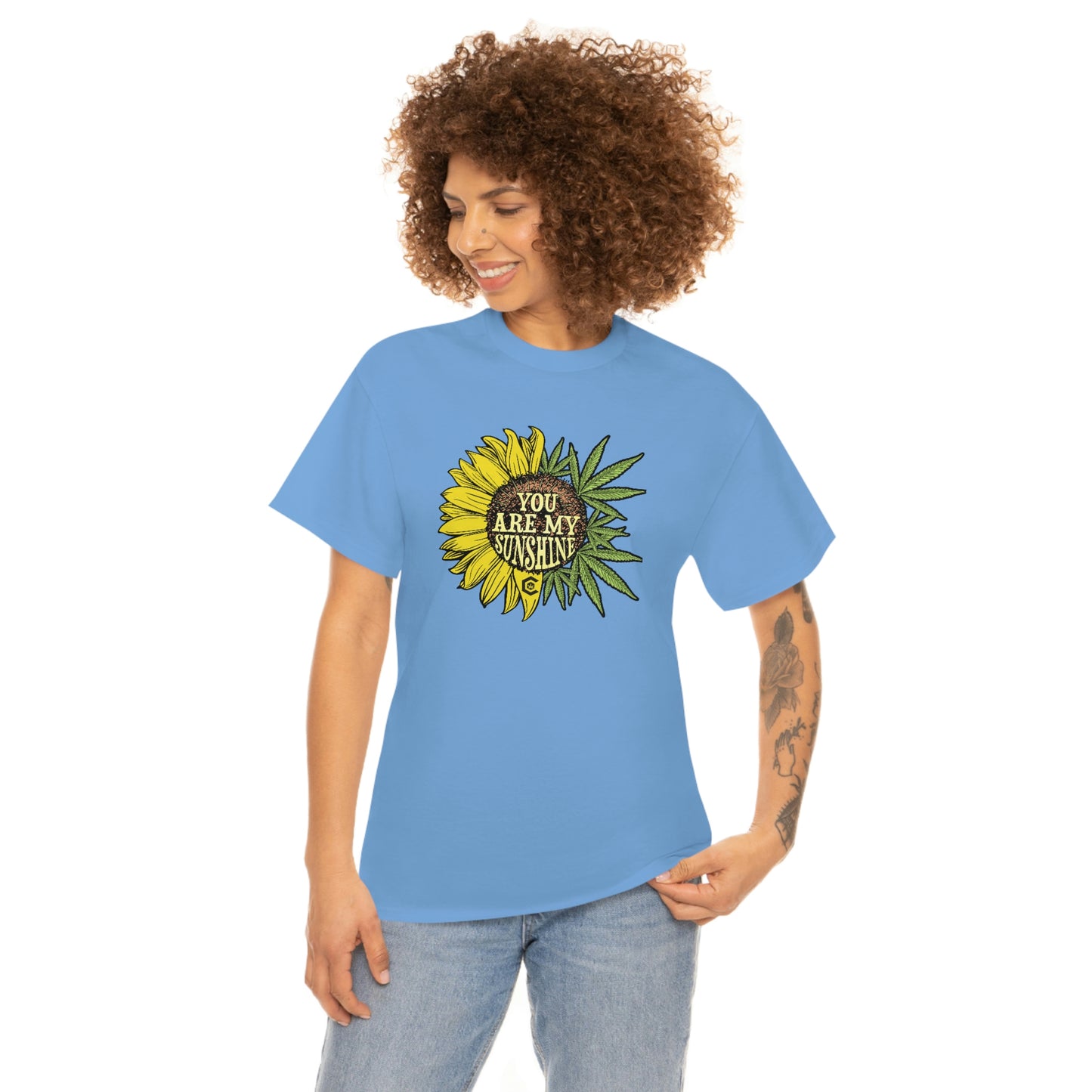 a woman wearing a yellow You Are My Sunshine Weed T-Shirt.