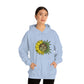 a woman wearing a You Are My Sunshine Cannabis Sweatshirt with a sunflower on it.
