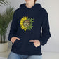 a woman wearing a You Are My Sunshine Cannabis Sweatshirt.